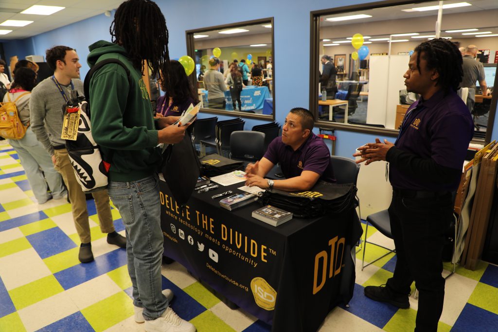 Interns talking to youth