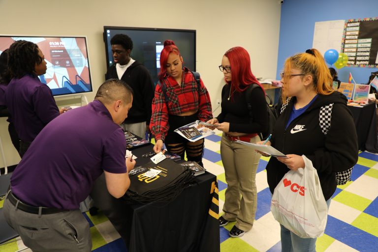 Intern talking with youths