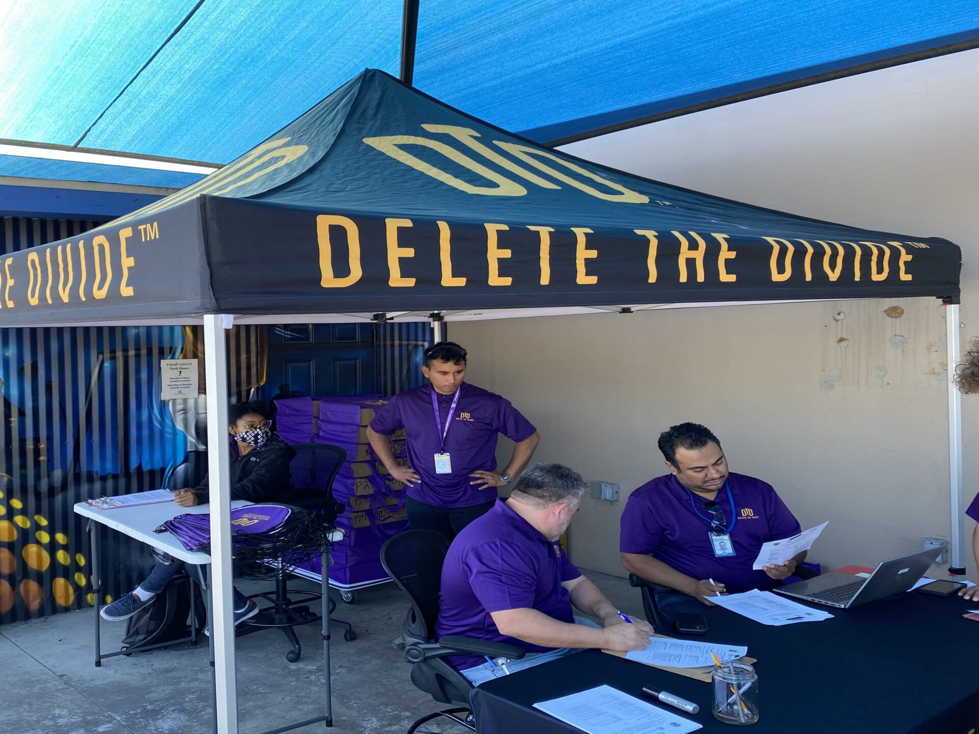 DTD staff and interns looking at forms