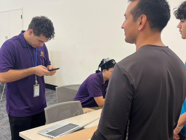 Intern on his phone