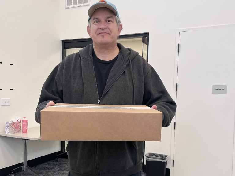 Veteran holding Laptop