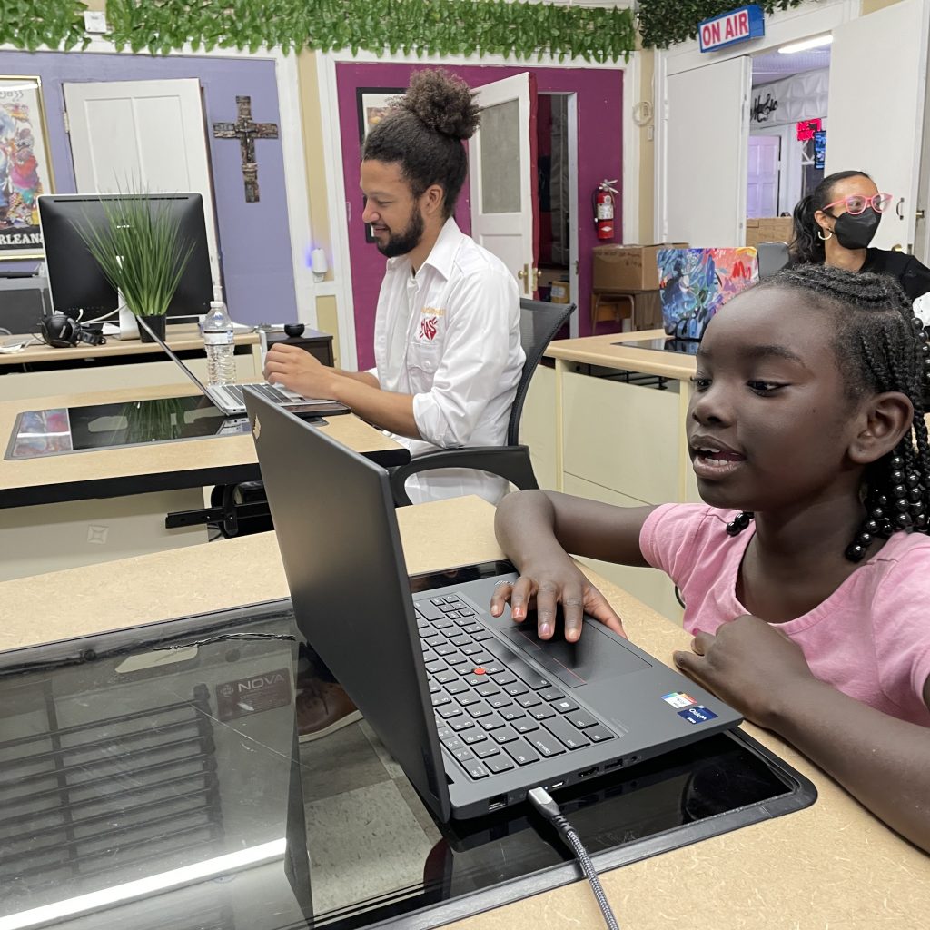 Young girl using laptop