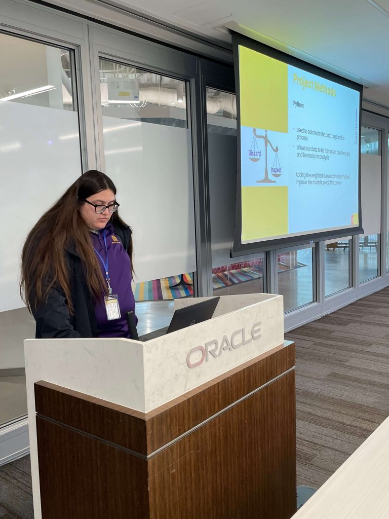 Delete the Divide intern giving a presentation