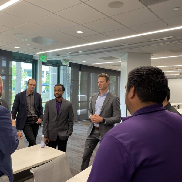 Delete The Divide members with group of professionals