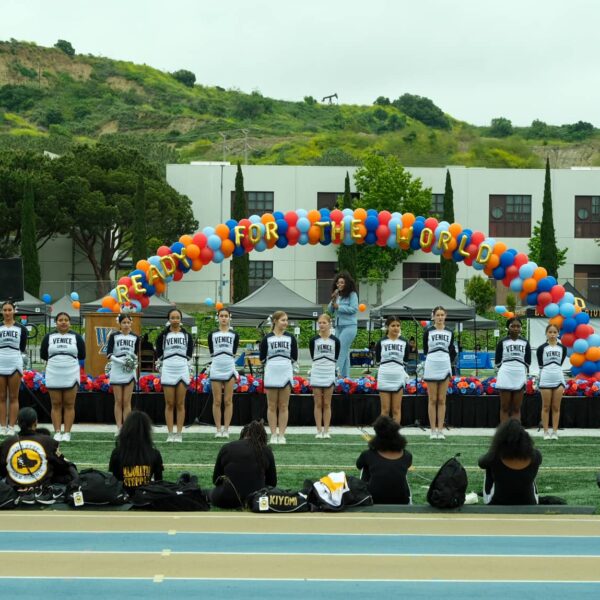 cheerleading students standing in a horizontal line