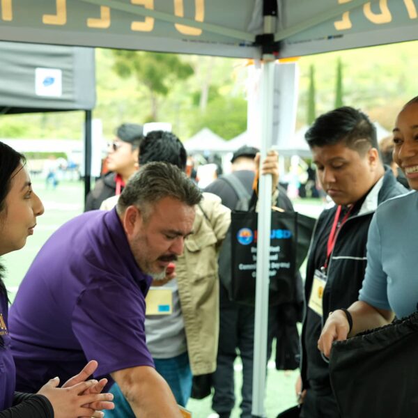 DTD interns discussing with students