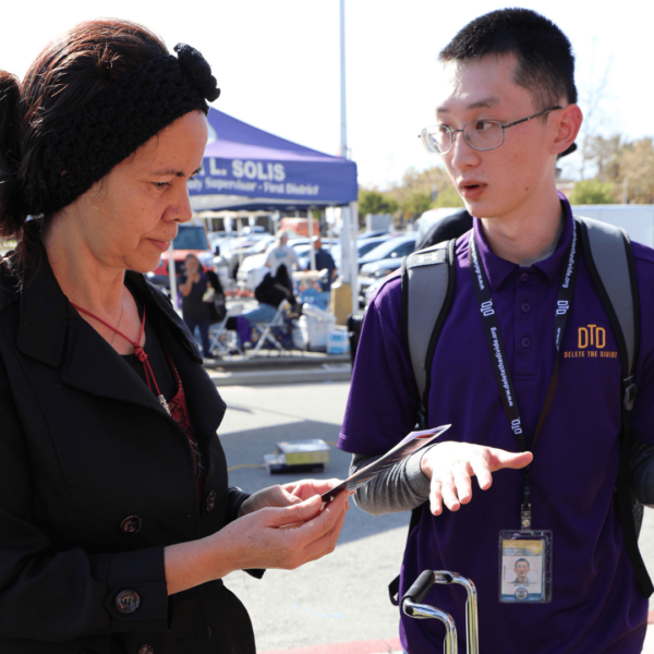 intern talking to an adult