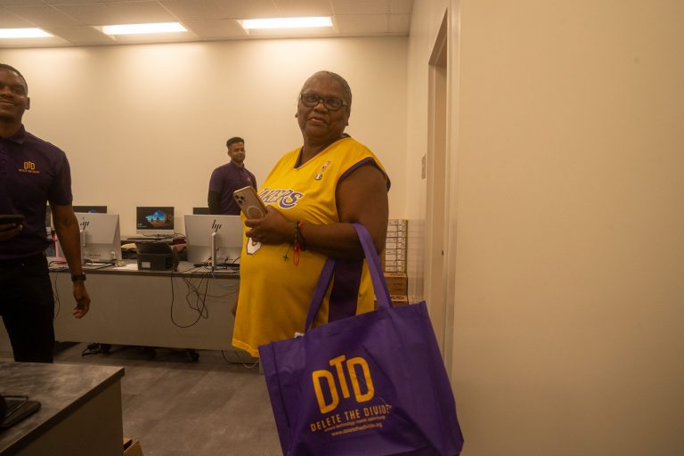 Participant posing with DTD giveaway bag