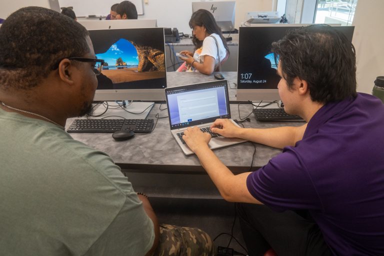 DTD member showing participant free laptop