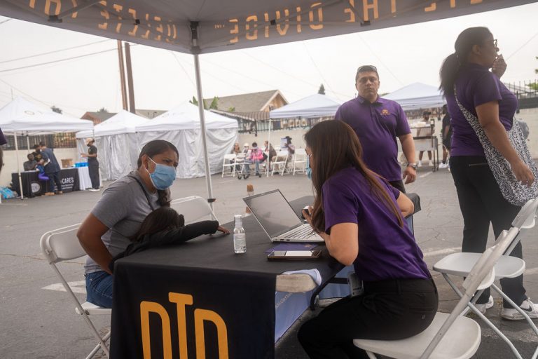 DTD member speaking to patron