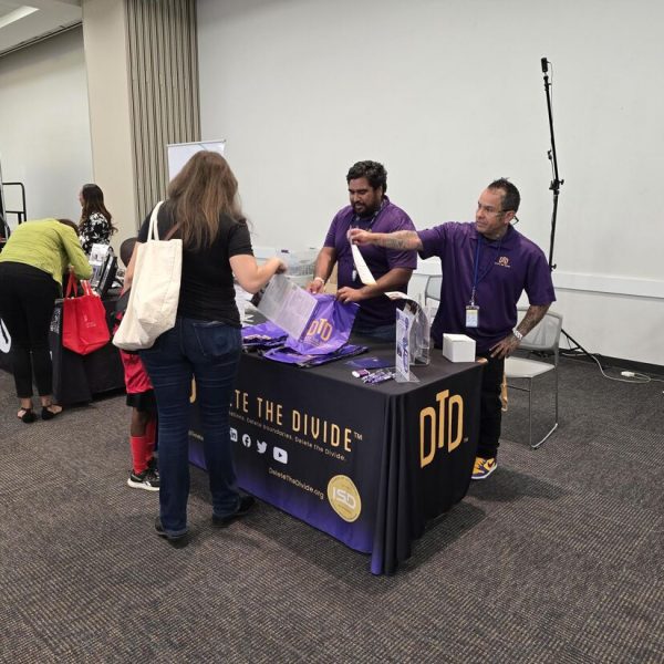 dtd interns helping at education expo