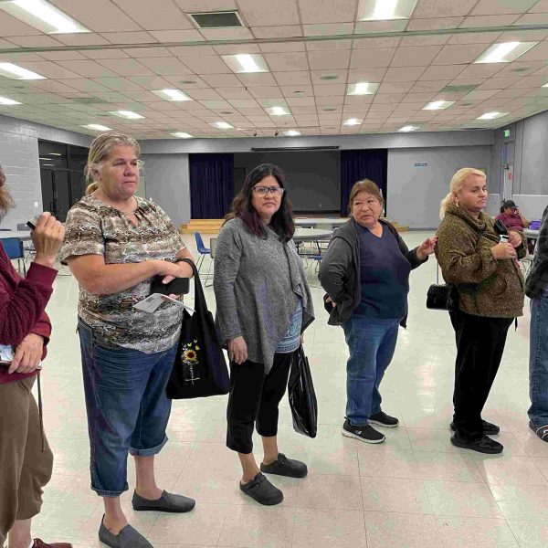 group of people at city of cudahy laptop giveaway