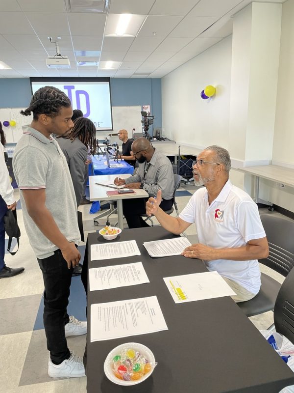 recruiters and interns at recruitment fair