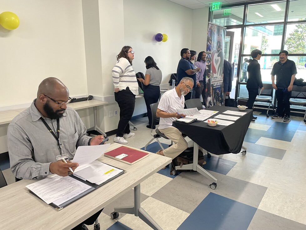 recruiters and a group of interns at recruitment fair