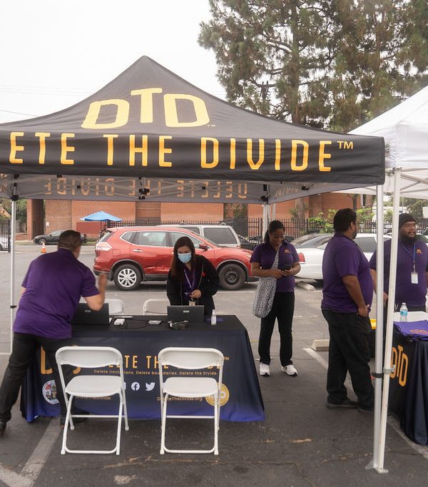 DTD interns standing around a booth