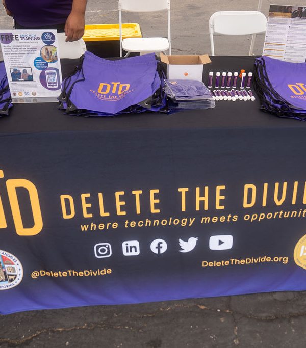 Delete the divide table with drawstring bags, micro cloths, chapstick, and flyers