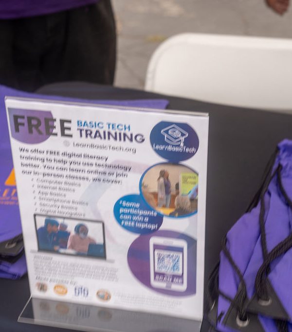 a flyer on a table that says Free basic tech training at LearnBasicTech.org