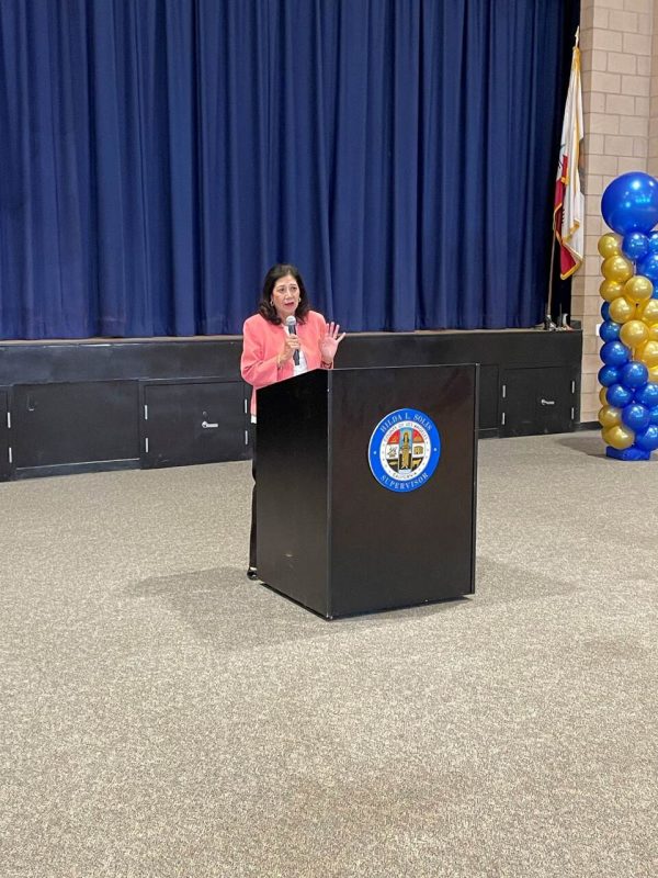L.A. County supervisor Hilda Solis talking behind a podium
